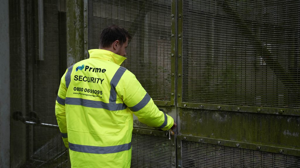 A Security Guard providing a keyholding & Alarm Response Service. The guard is responding to an Alarm at a client's site