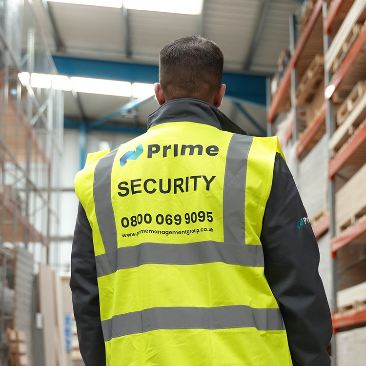 a security guard patrolling a warehouse